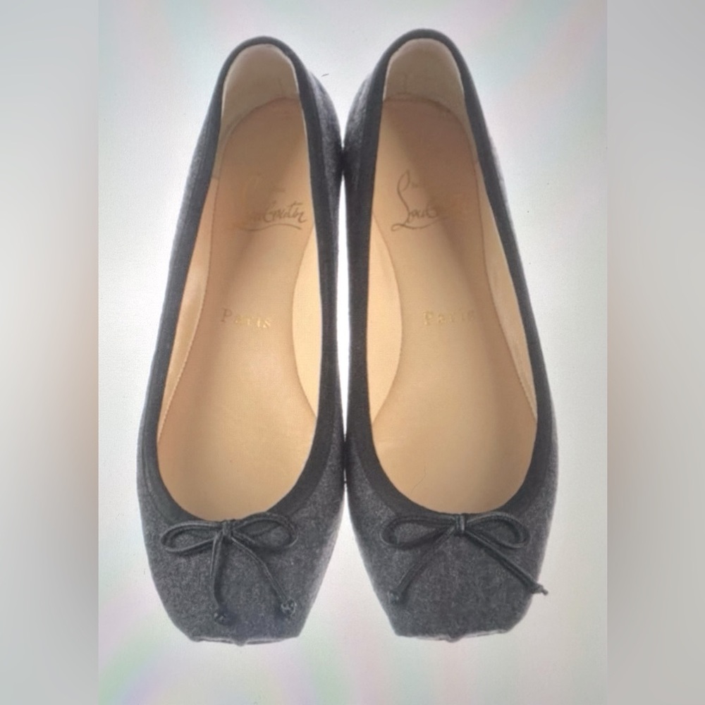 Christian Louboutin Gray Flats with black trim. Size 38. Fits like 7.5 or 7
